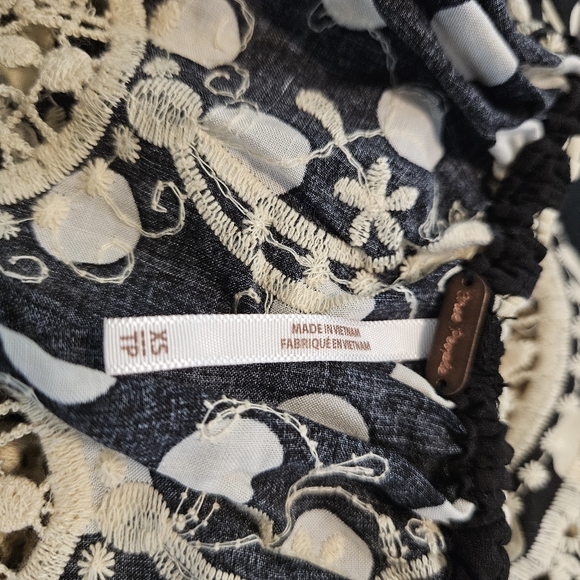 Free people top size XS. Black w cream Polkadots.          A - Picture 2 of 6